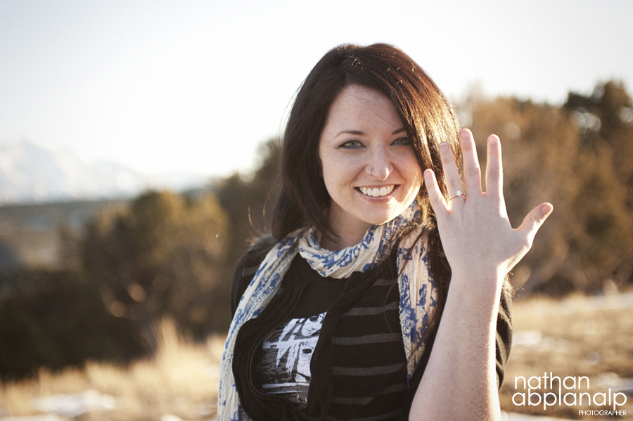 Woman showing off engagement ring in Aspen, CO