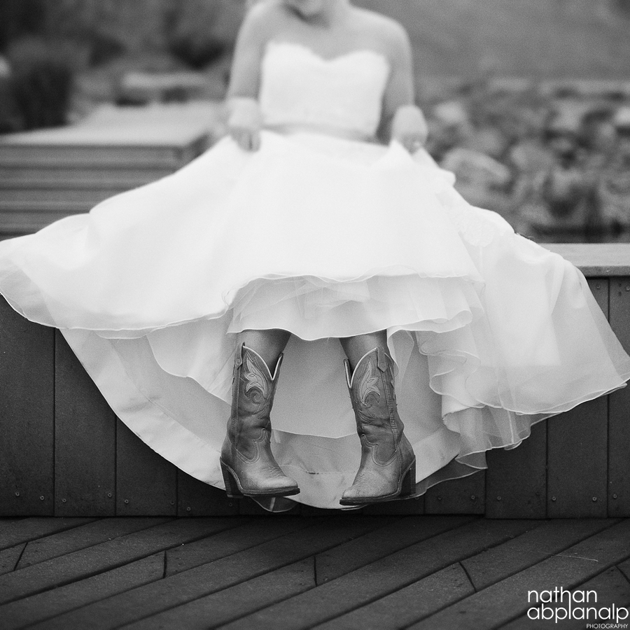 Bride in cowboy boots at the Arbor Events