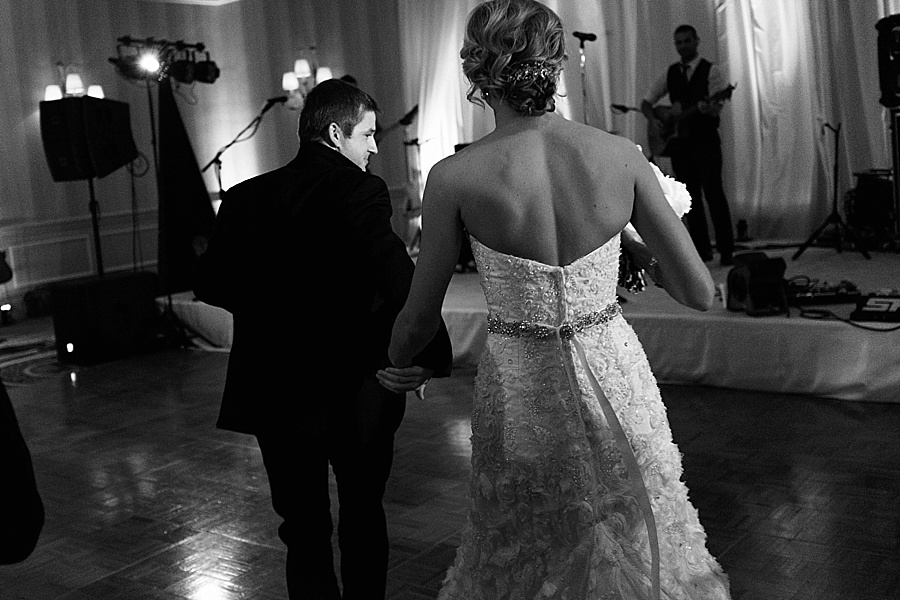Bride and groom enter reception at the Carmel Country Club in Charlotte NC