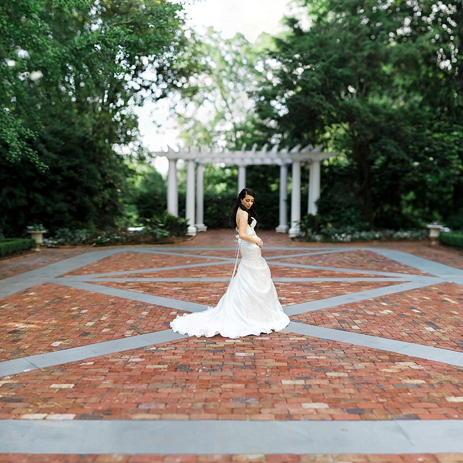 Bride in the court yard at the Duke Mansion in Charlotte NC