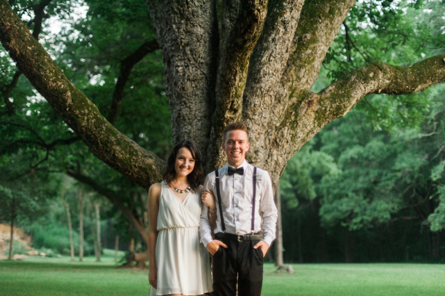 Man and woman standing in front of large tree in charlotte nc