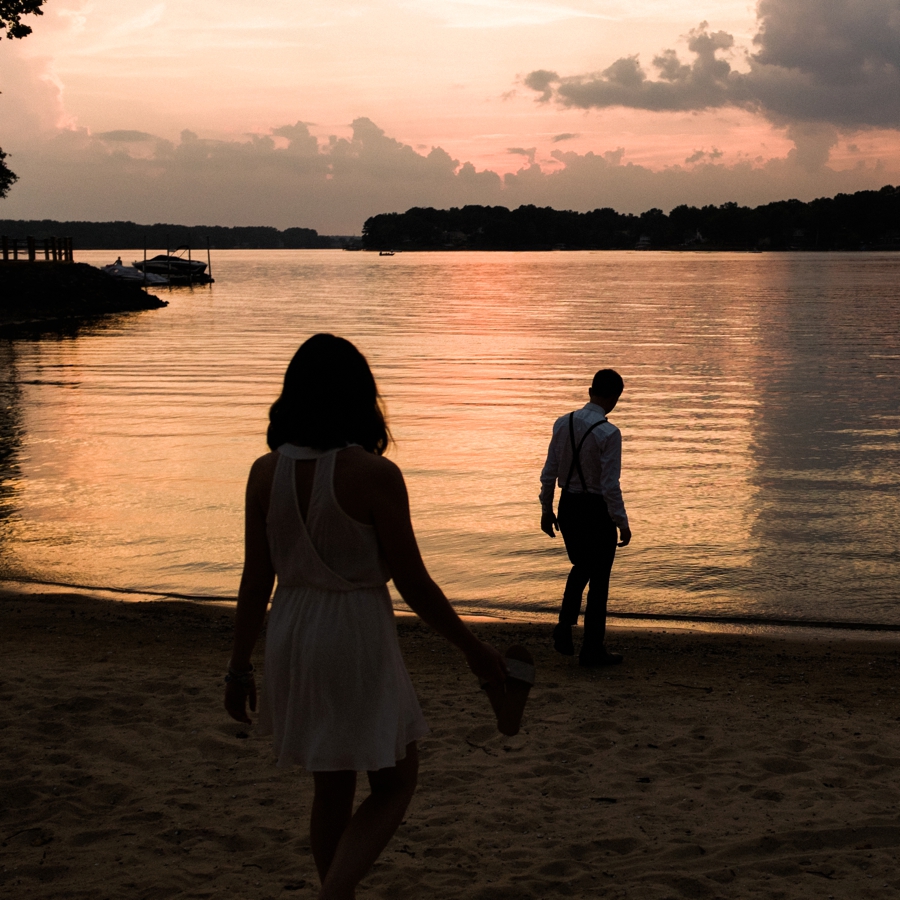 Man and woman walking down to Lake Wylie in Charlotte NC