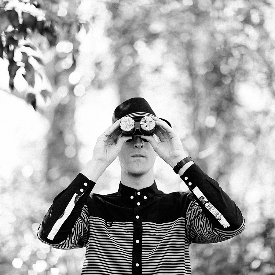 Man holding cookie binoculars for The Cookie Cult in Charlotte NC