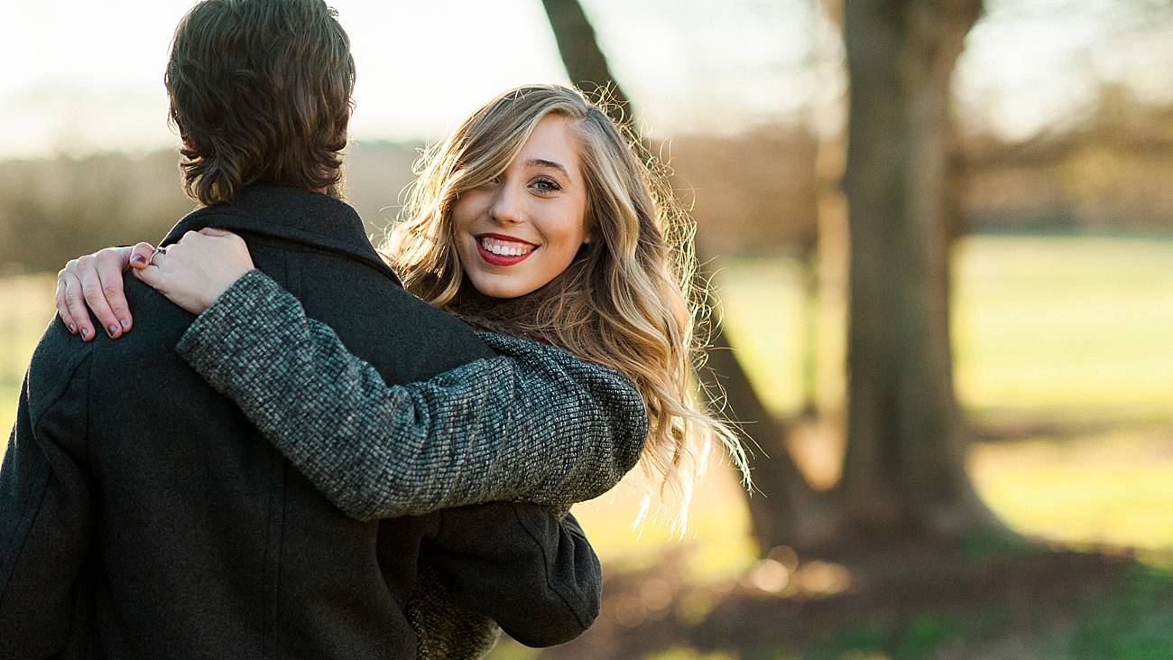 man holds woman in his arms at Ann Springs Close Greenway