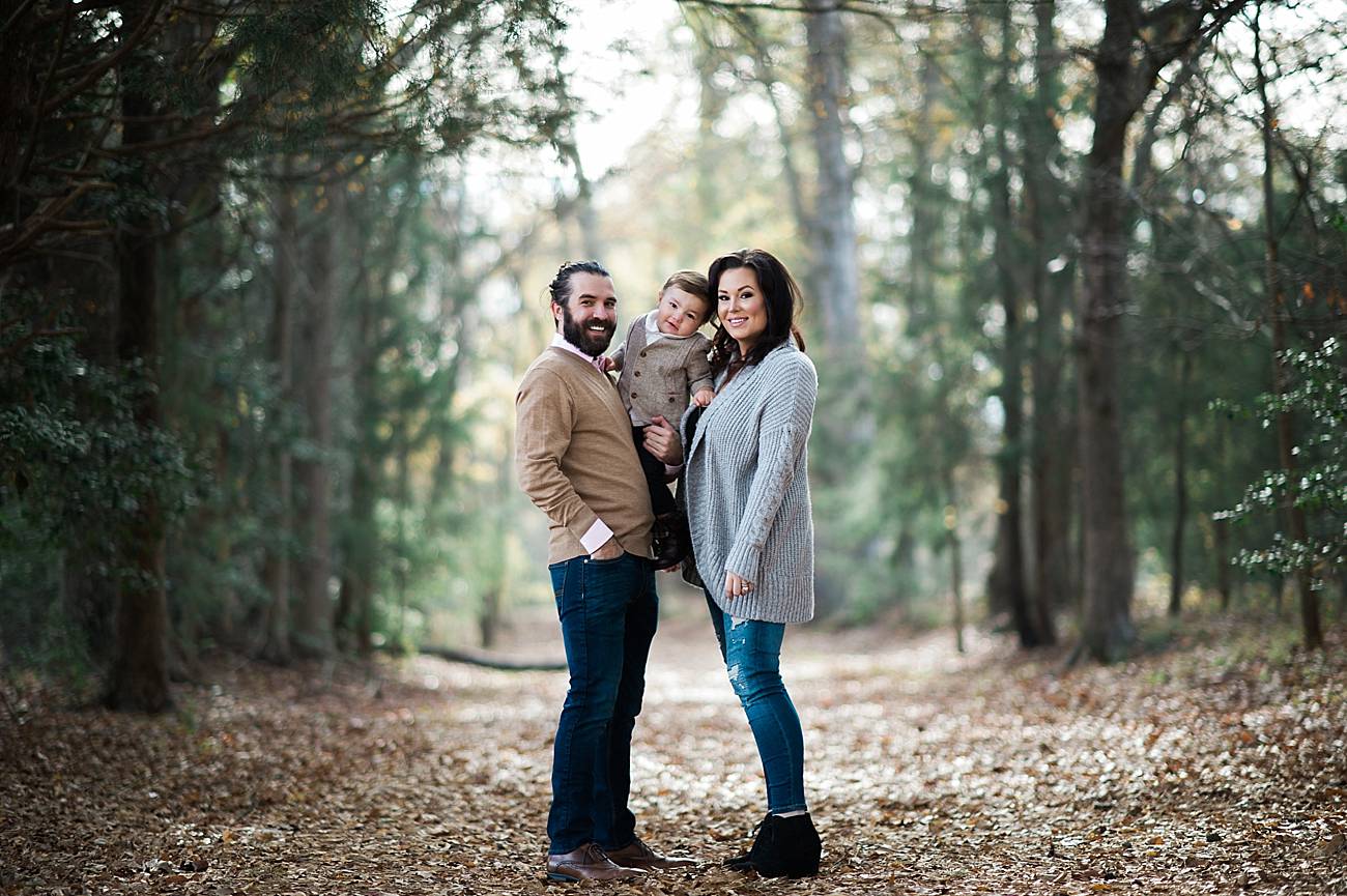 Family stands under trees in Westminster Park, Rock Hill, SC