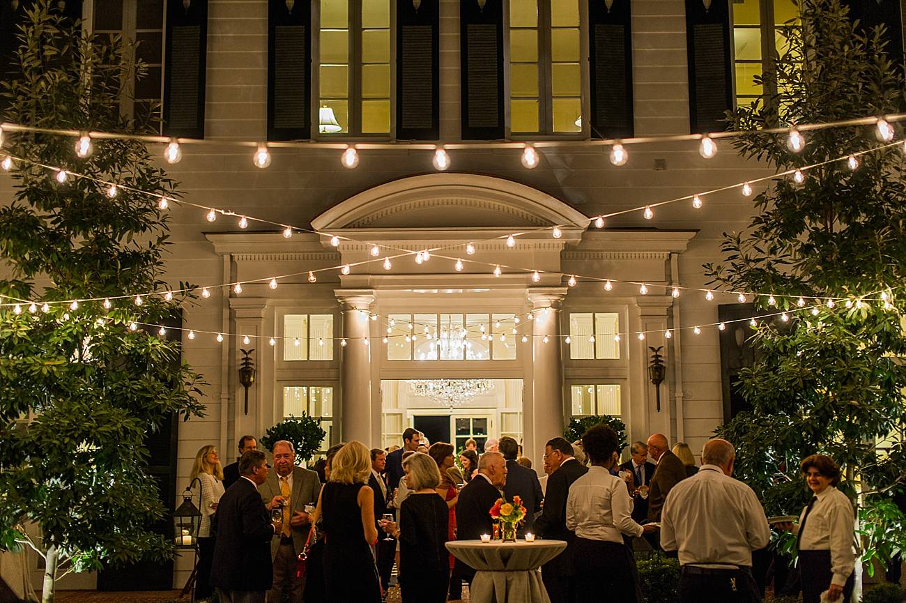 Guests mingle outside of the Duke Mansion in Charlotte, NC