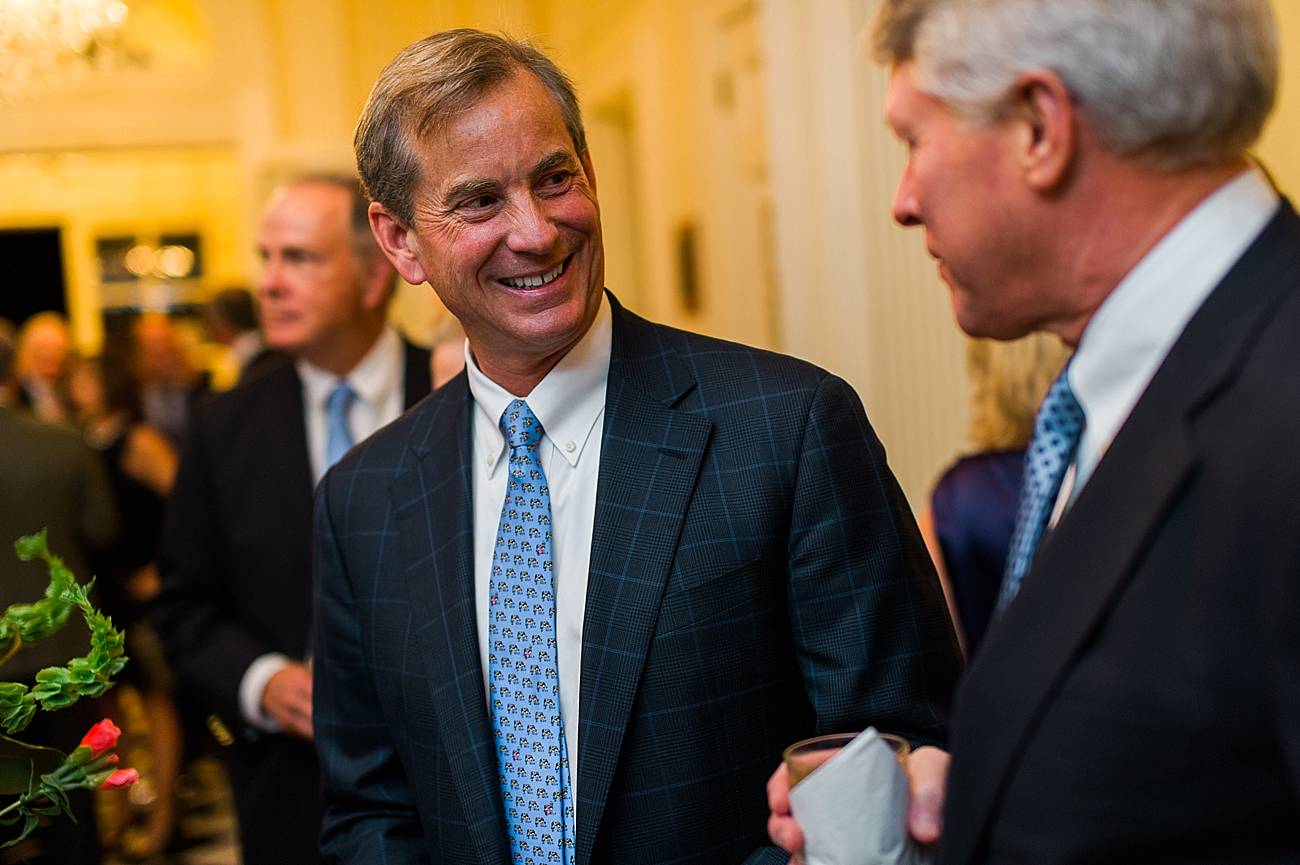 A guest smiles while talking at the Duke Mansion in Charlotte, NC