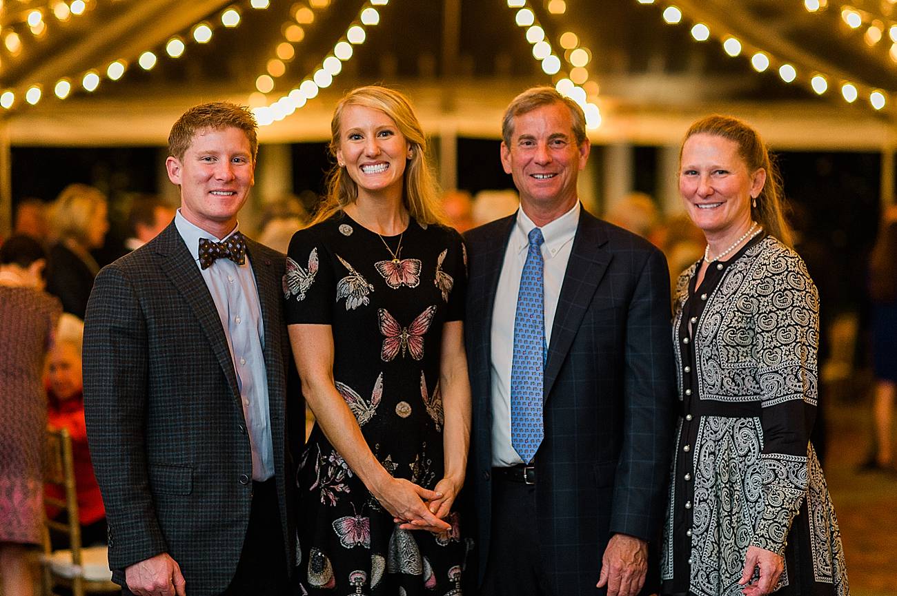 family poses for a portrait during their engagement party at the duke mansion