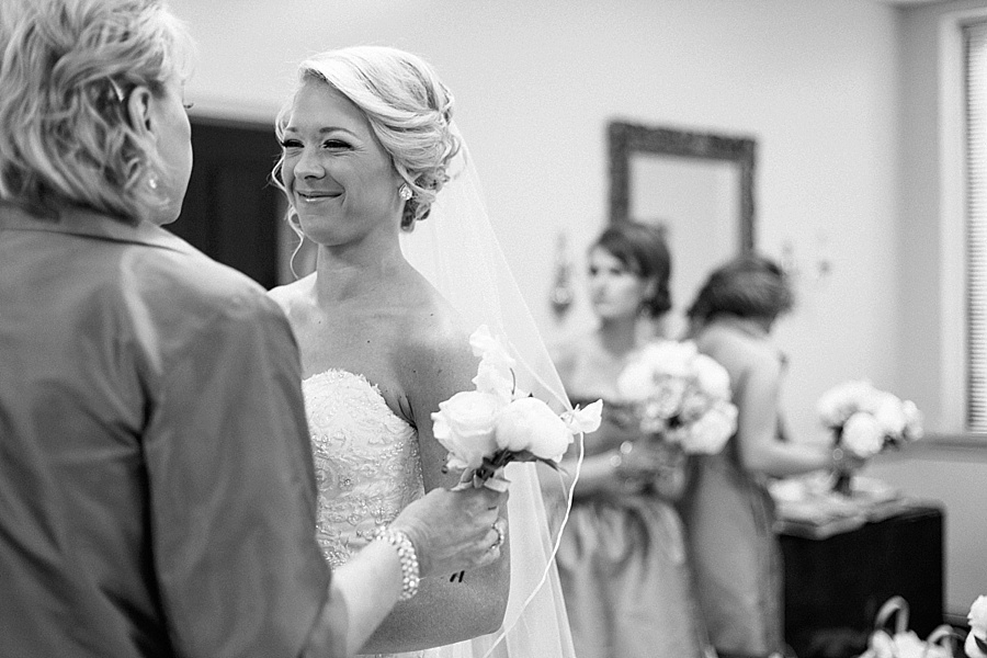 Bride smiling with mother at Myers Park United Methodist Church in Charlotte NC