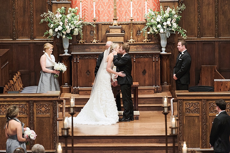 Bride and Groom share a first kiss at Myers Park United Methodist Church in Charlotte NC