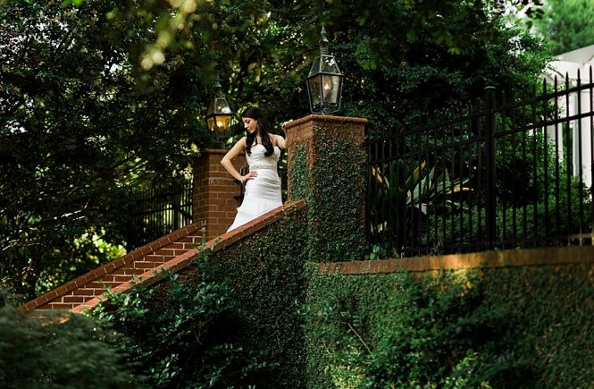 Bride on brick stairs of the Duke Mansion in Charlotte NC