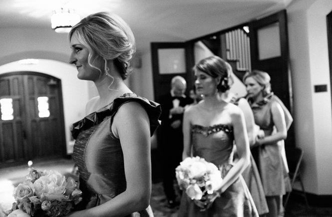 Bridesmaids look on at the Bride at the Carmel Country Club in Charlotte NC