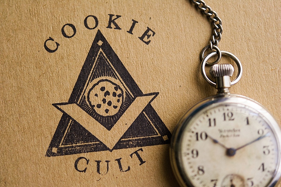 The Cookie Cult box with a pocket watch in Charlotte NC