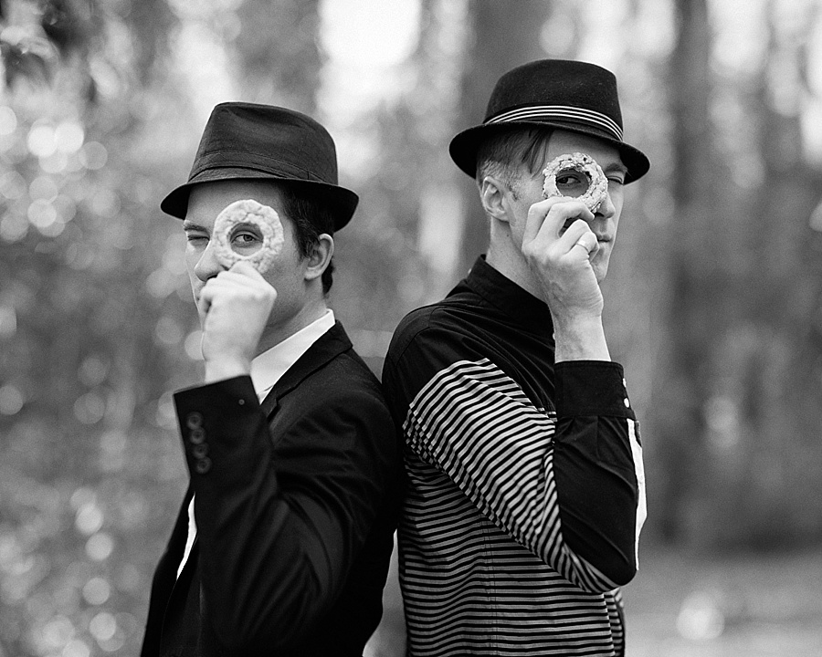 Two men with cookie monocles for The Cookie Cult in Charlotte NC