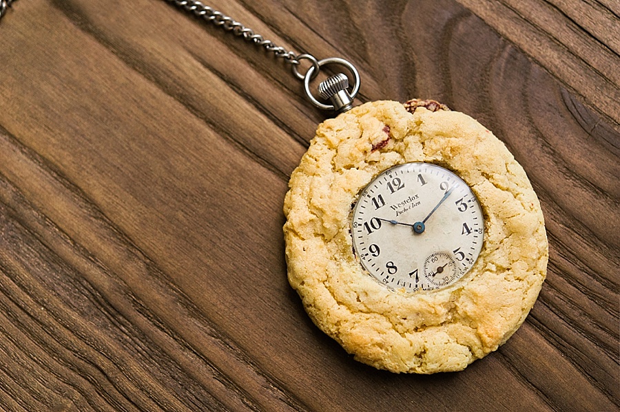 A pocket watch sitting in a cookie for The Cookie Cult in Charlotte NC