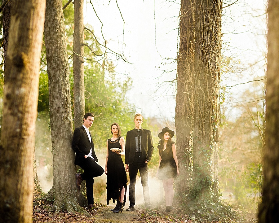 Group standing in the mist between two trees for The Cookie Cult in Charlotte NC