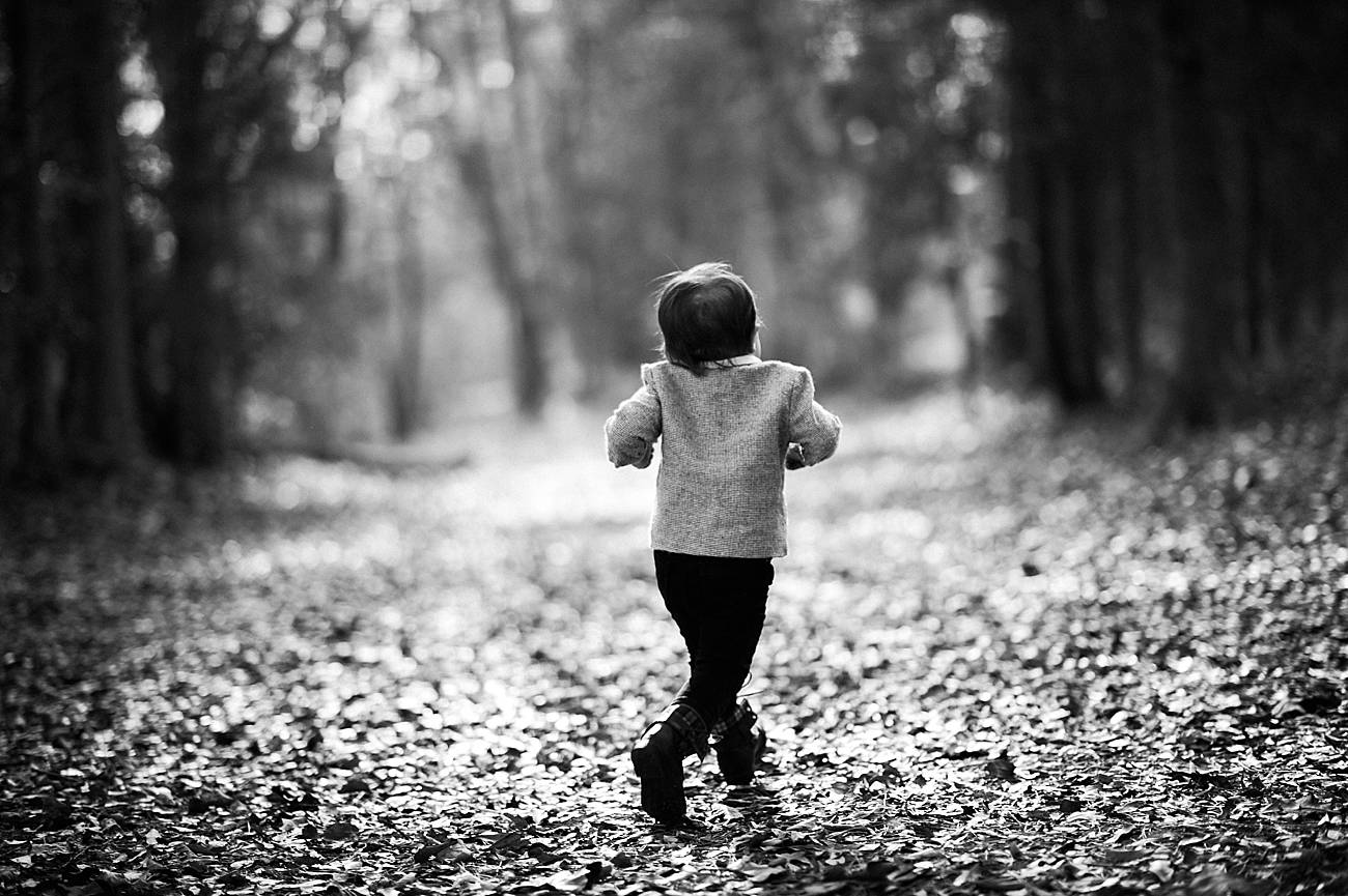 Little boy runs through the park at Westminster Park, Rock Hill, SC