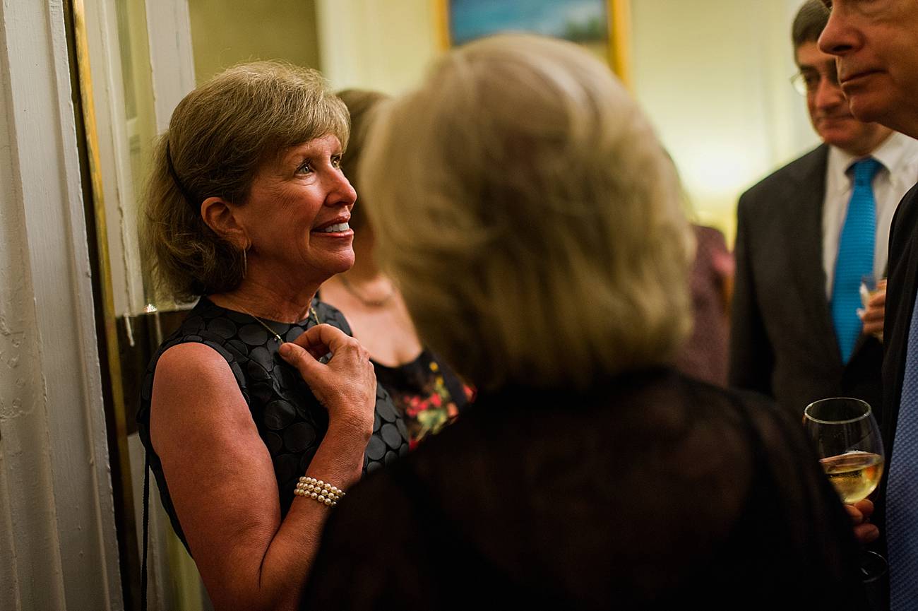 Guests smile while talking at the duke mansion in Charlotte, NC